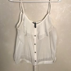 Maurice’s white tank top